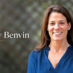 Kathy Benvin portrait with blurred background and name text