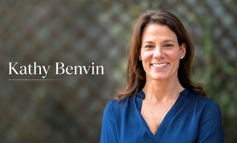 Kathy Benvin portrait with blurred background and name text
